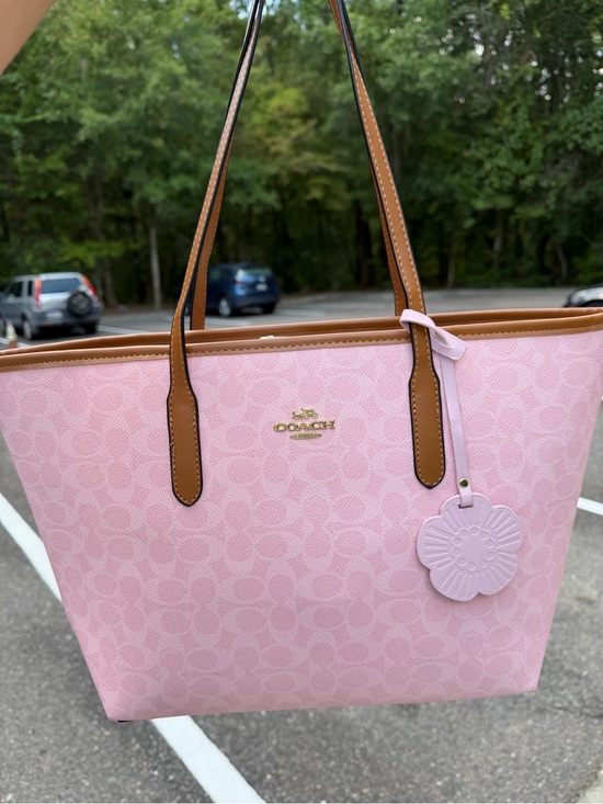 Coach Handbags - Coach Pink Signature Tote with Brown Trim and Floral Charm